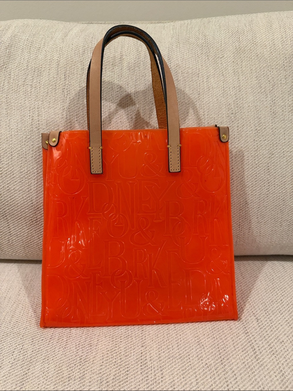 Glossy Orange Dooney & Bourke Acrylic Beach Tote Bag with Tan leather Handles